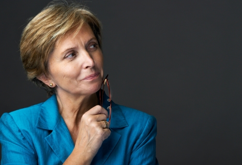 woman thinking about good board report Woman thinking about board report